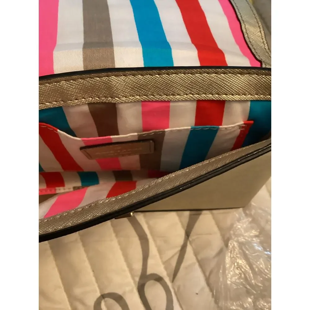 Kate Spade New York Newbury Lane Sally Crossbody bag in metallic gold